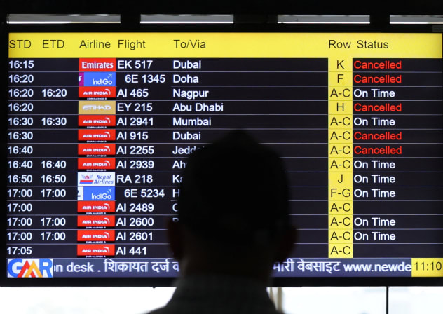  A man views a screen displaying flight information at the Indira Gandhi International airport in New Delhi, India, March 2, 2026. 