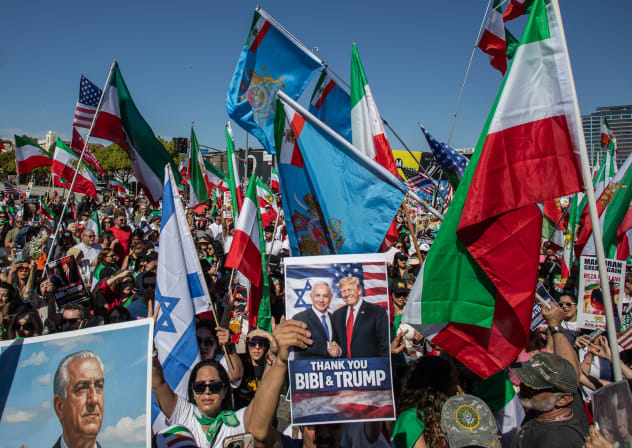 Members of the Iranian community celebrate in front of the Federal Building on March 1, 2026 in Los Angeles, California.