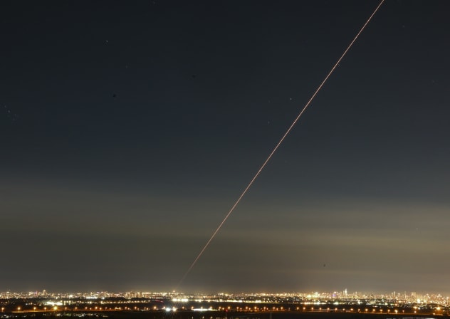 Anti-missile system fires interception missiles as missiles fired from Iran as it seen over central Israel, March 5, 2026.