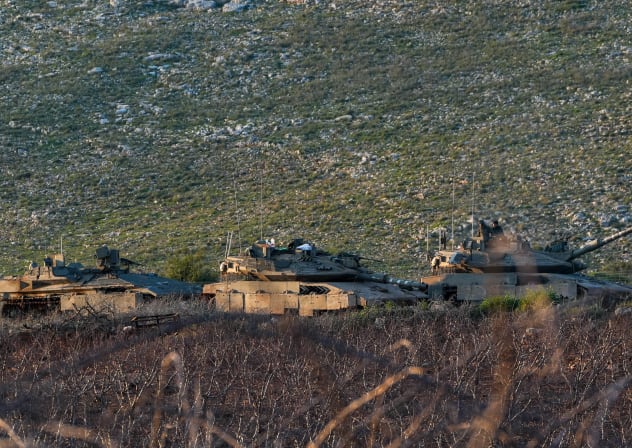 Israeli military vehicles and tanks are seen along the Israeli border with Lebanon amid the ongoing war with Iran and Hezbollah, March 7, 2026.