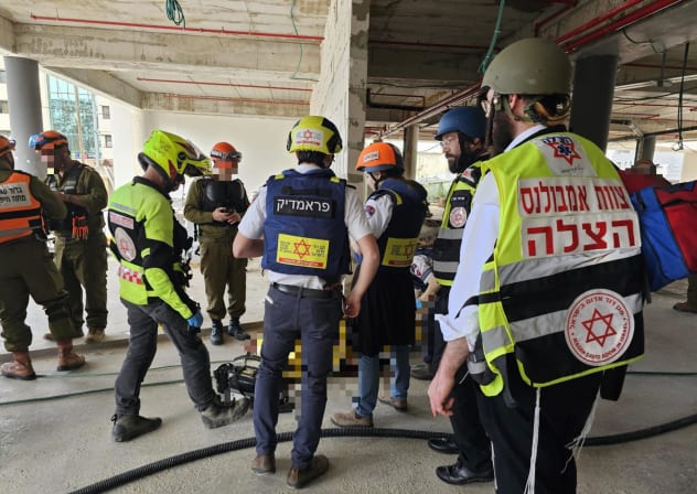 Magen David Adom paramedics at the scene of a missile hit, March 9, 2026.