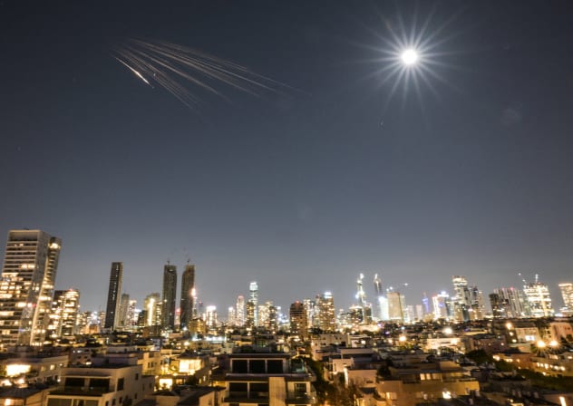 An Iranian missile with cluster munitions flies towards Israel, amid the U.S.-Israeli conflict with Iran, in central Israel, March 5, 2026.