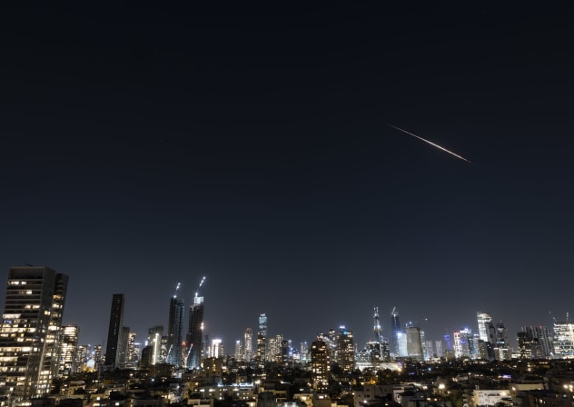 Anti-missile batteries fire interception missiles toward incoming ballistic missiles launched from Iran, as seen over Jerusalem, during the war with Iran and ongoing missile fire toward Israel, March 11, 2026. 