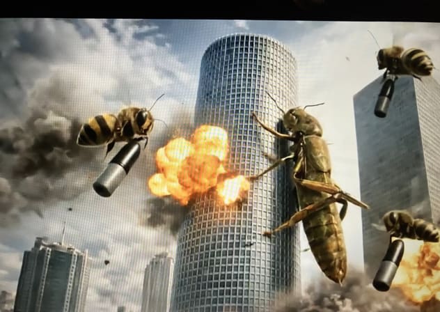 An Eretz Nehederet segment depicting an Iranian official showing AI pictures of Tel Aviv buildings swarmed by massive insects.