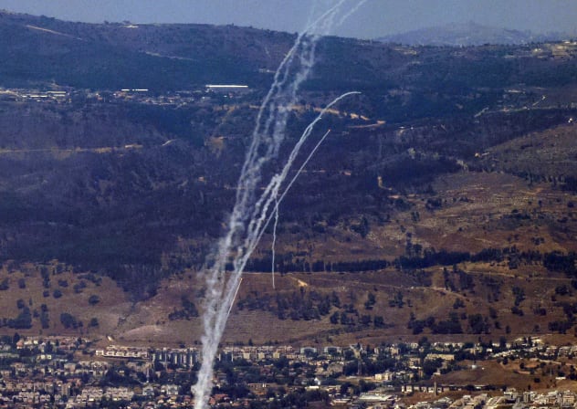 Rockets fired from southern Lebanon are intercepted by Israel's Iron Dome air defense system over the Upper Galilee region in northern Israel on August 9, 2024, amid ongoing cross-border clashes between Israeli troops and Hezbollah terrorists. 
