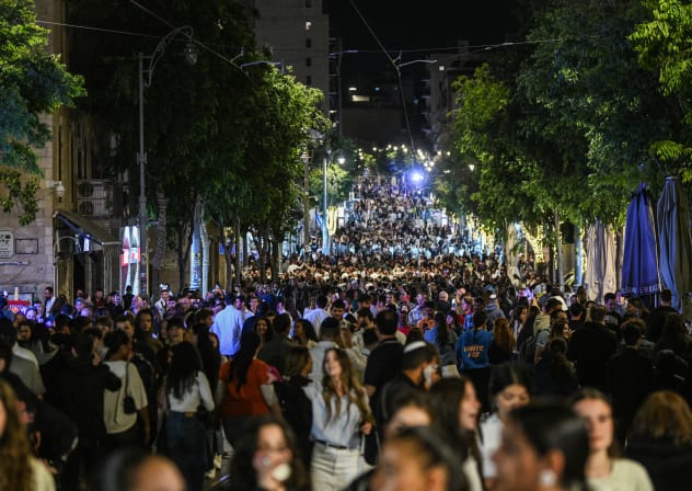 ISRAELIS TEND to experience their identity more as members of a nation than as members of local congregations. Pictured: Celebrating Israel’s 77th Independence Day in central Jerusalem, May 1, 2025.
