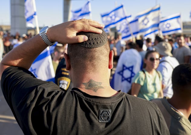 The Sde Teiman case is over. The lesson should not be. A man adjusts his kippah as right-wing Israelis demonstrate next to the Sde Teman military base near Beersheba, against the detention for questioning of military reservists who were suspected of abuse of a detainee following the October 7 attack