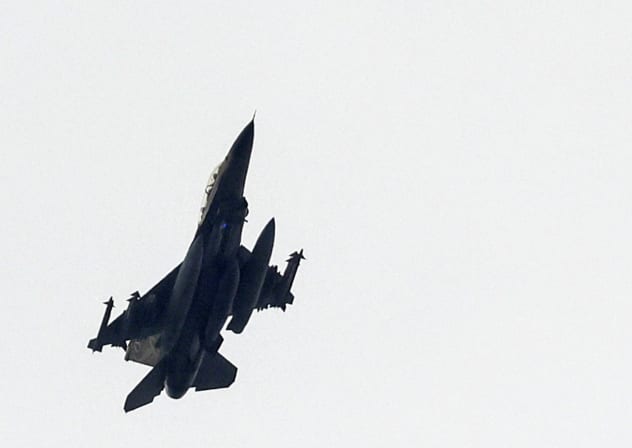 This picture, taken a position in northern Israel, shows an Israel Air Force fighter jet flying over the border area with southern Lebanon on March 13, 2026.