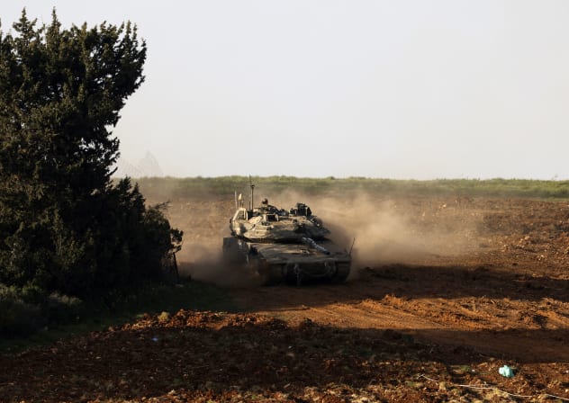 An Israeli army tank deploys at a position in the Upper Galilee in northern Israel near the border with Lebanon on March 12, 2026.