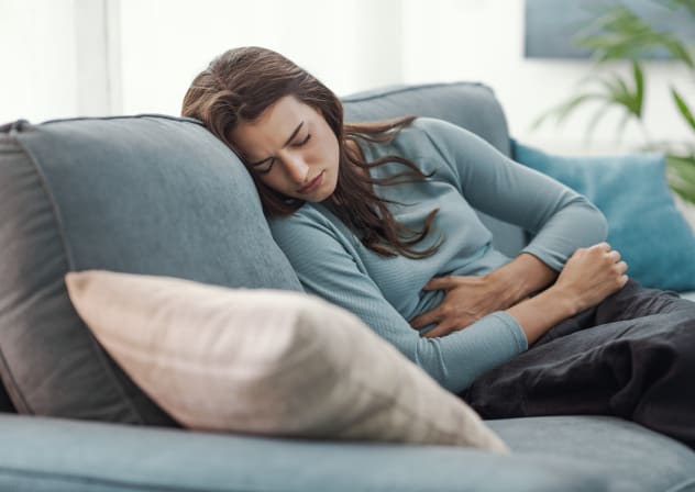Illustrative image of a woman suffering from pain.