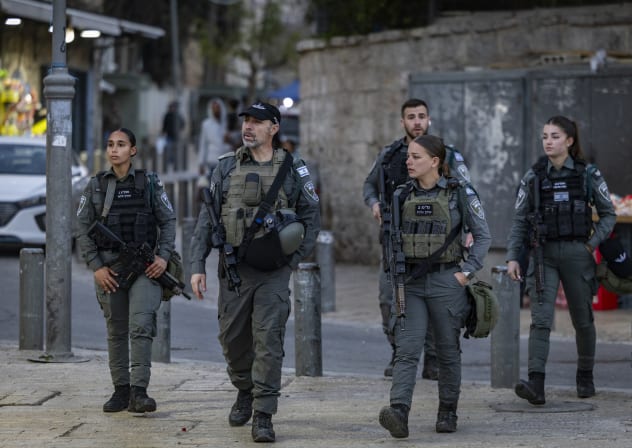 Israeli Border Police officers patrol outside Damascus Gate in Jerusalem’s Old City during the beginning of the holy fasting month of Ramadan, February 18, 2026.
