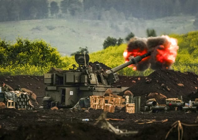 An artillery unit stationed near the Israeli-Lebanese border fires amid the ongoing war with Iran and Hezbollah, March 15, 2026