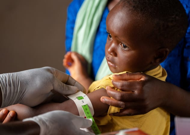 Junior Kondwani is tested for nutrition status at Chipili Community Center in Lilongwe, Malawi in this undated handout photo. 