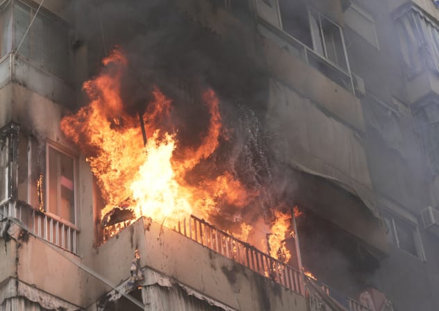 Flames engulf a building following an Israeli air strike in Beirut, following an escalation between Hezbollah and Israel amid the U.S.-Israeli conflict with Iran, in Lebanon, March 18, 2026. 