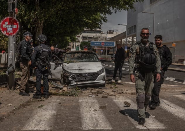 The scene where an Iranian ballistic missile struck a vehicle in Tel Aviv, March 22, 2026