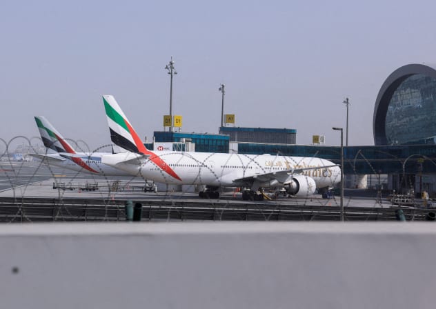 Planes are parked at Terminal 3 of the Dubai International Airport, following the United States and Israel strikes on Iran, in Dubai, United Arab Emirates, March 2, 2026.