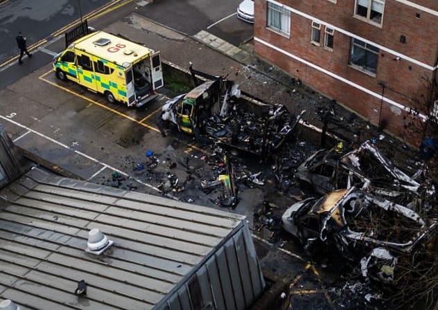 An aerial view as fire services continue to monitor the scene after four Hatzola ambulances were set on fire overnight next to Machzike Hadath Synagogue, on March 23, 2026 in the Golders Green area of London, England.