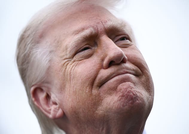 US President Donald Trump speaks to journalists before boarding Marine One as he departs from the South Lawn of the White House in Washington, DC, on March 20, 2026 for his Mar-a-Lago residence.