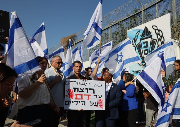 Israelis protest outside Maasiyahu prison, central Israel, the possible release of terrorist who tortured and murdered Israeli soldier Moshe Tamam nearly 40 years ago. May 31, 2023.
