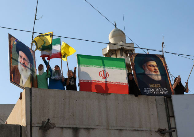 People celebrate what they say is Iran's victory, after US President Donald Trump announced a ceasefire between Israel and Iran, in Beirut, Lebanon June 25, 2025.