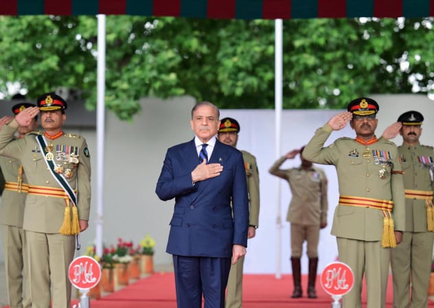 PAKISTAN'S PRIME Minister Shehbaz Sharif, along with Chief of the Army Staff (COAS) of Pakistan Asim Munir, reviews the parade at the passing out ceremony of 151st Long Course at the Pakistan Military Academy (PMA) Kakul, Abbottabad, Pakistan April 26, 2025.