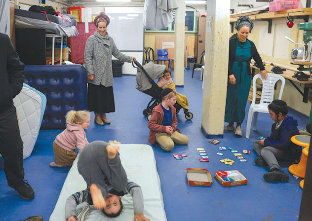 Children play in a Jerusalem shelter