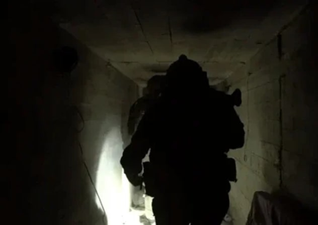 IDF soldiers operate inside an uncovered Hezbollah tunnel in southern Lebanon, March 27, 2026.