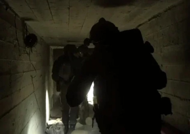 IDF soldiers operate inside an uncovered Hezbollah tunnel in southern Lebanon, March 27, 2026.
