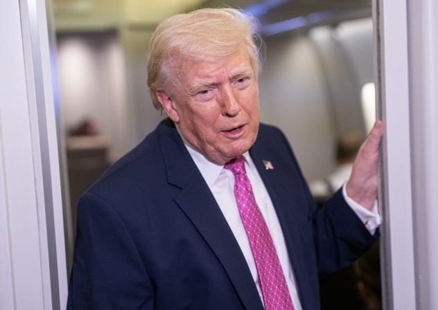 US President Donald Trump speaks with members of the media onboard Air Force One on March 29, 2026 while en route to Joint Base Andrews, Maryland from West Palm Beach Florida.