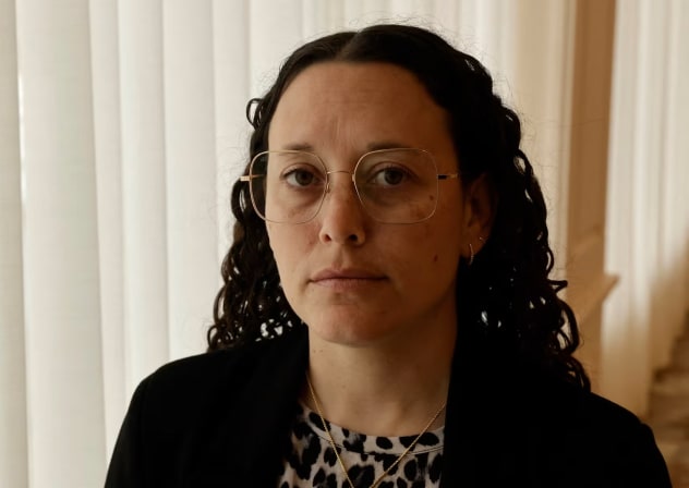 Temple Israel Rabbi Jen Lader talks to a reporter at Shenandoah Country Club in West Bloomfield, Michigan, on March 13, 2026.