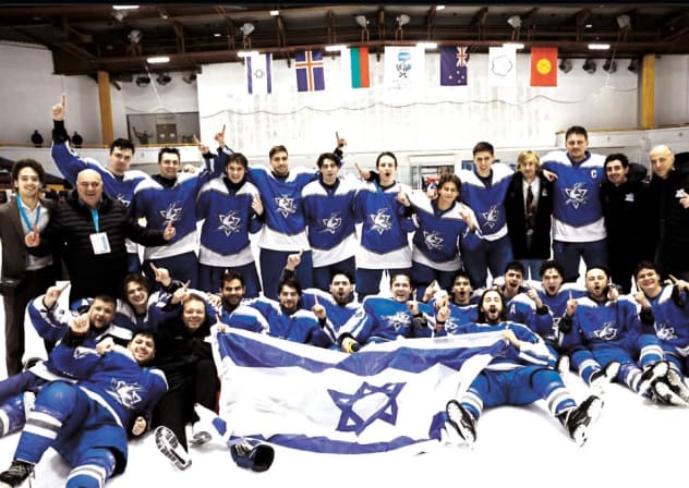 THE ISRAEL national team celebrates on the ice in Sofia, Bulgaria, after beating Iceland for the gold medal at the IIHF World Championship Division II Group B tournament over the weekend. 