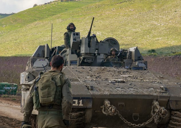 Israeli military vehicles are seen along the Israeli border with Lebanon amid the ongoing war, April 8, 2026. 