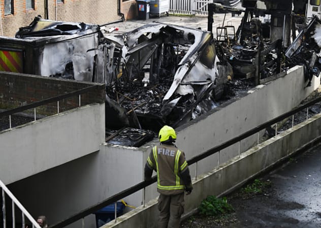  The burnt wreckage of Hatzola ambulances as fire services continue to monitor the scene after they were set on fire overnight next to Machzike Hadath Synagogue, on March 23, 2026 in the Golders Green area of London, England.