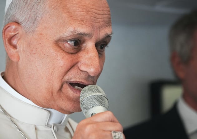 Pope Leo XIV speaks to journalists aboard the papal flight from Malabo to Rome, April 23, 2026, at the end of his 11-day pastoral visit to Africa. 
