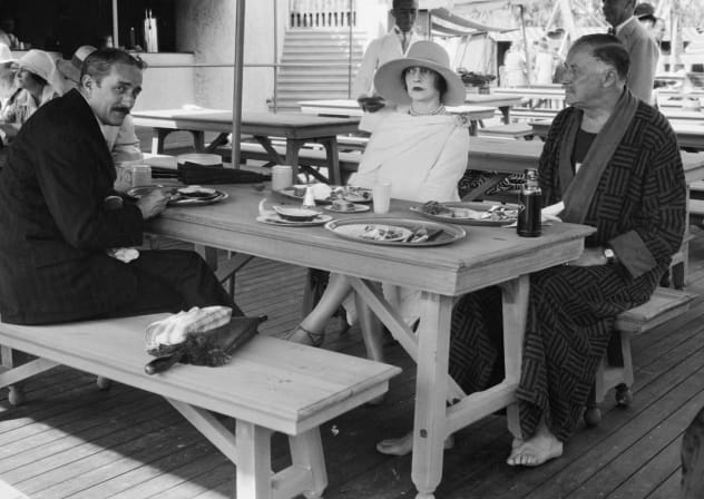 "Sojourning at the exclusive Palm Beach Bath and Tennis Club in Florida are L to R; Mr. and Mrs. Jerome Napoleon Bonaparte of New York and Newport, and Mr. Paris Singer of London and the Riviera. All socially prominent," Feb. 16, 1927.