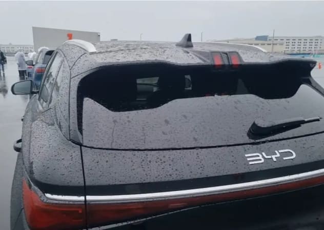 Brake lights integrated into the rear spoiler. The most distinctive identifying feature of the new model.