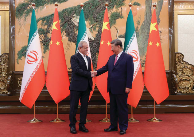 IRANIAN PRESIDENT Masoud Pezeshkian and Chinese President Xi Jinping meet in Beijing, last year.