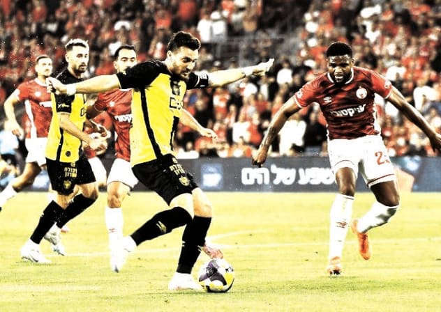 BEITAR JERUSALEM (in yellow) and Hapoel Beersheba are in a tight title race, separated by just two points after their 2-2 draw over the weekend.