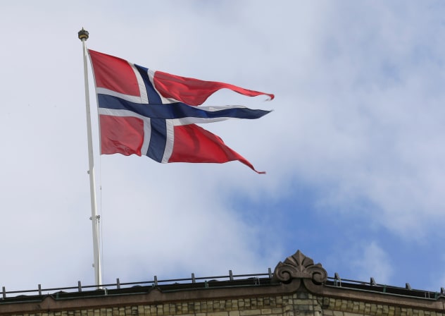 A Norwegian flag flutters over building in Oslo, Norway May 31, 2017.