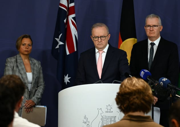 Australia's Prime Minister Anthony Albanese (C) speaks on the Royal Commission on last year's mass shooting incident in Sydney on April 30, 2026.
