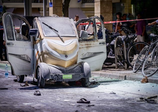 Security and rescue forces at the scene where an electric vehicle caught fire from its battery in Tel Aviv, July 29, 2024.