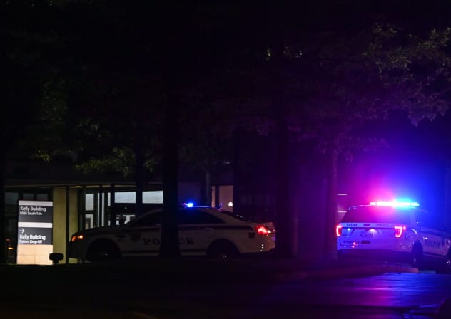 Tulsa police cars block the entrance of the Natalie Medical Building at Saint Francis Hospital campus in Tulsa, Oklahoma, on June 1, 2022. 