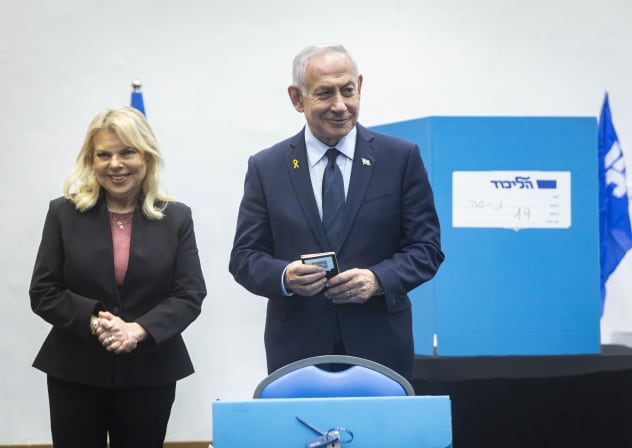 Israeli Prime Minister Benjamin Netanyahu and his wife Sara cast their vote during the elections for the Likud Central Committee, at the International Convention Center in Jerusalem, November 25, 2025.