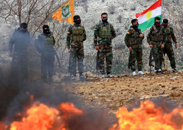 Iranian Kurdish fighters from the Kurdistan Freedom Party, known as PAK take part in a training session at a base on the outskirts of Erbil, Iraq.