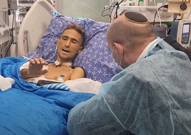NAFTALI BENNETT visits Sgt. Yona Brief, wounded in Kfar Aza on Oct. 7. After 417 days of hospitalization, Brief succumbed to his injuries. 