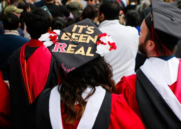Graduates and guests of Rutgers University graduation exit the ceremonies