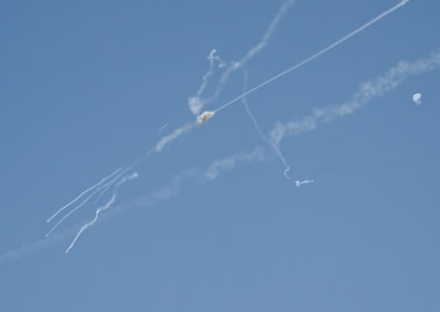 Explosions from the interception of an Iranian projectile are seen in the sky over Dubai on March 1, 2026.