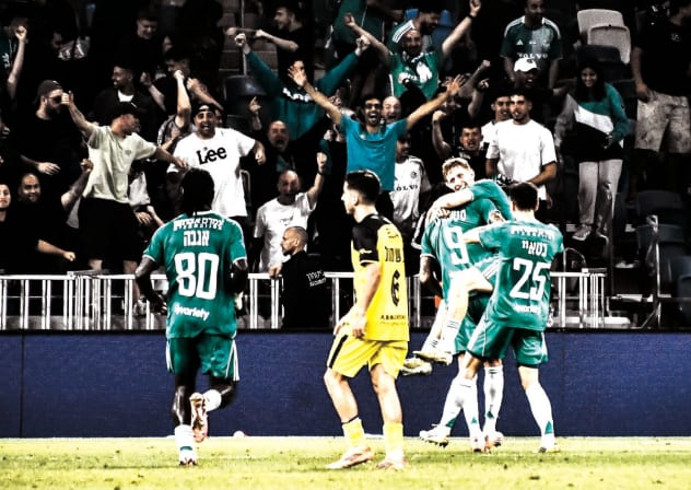 MACCABI HAIFA players celebrate their final goal in the 3-0 victory over Beitar Jerusalem in Israeli Premier League action on Saturday at Sammy Ofer Stadium.