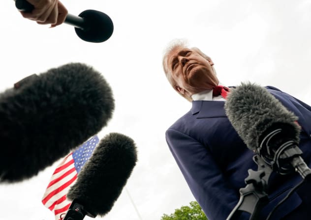 US President Donald Trump listens to reporters at the White House in Washington, DC, US, May 8, 2026.