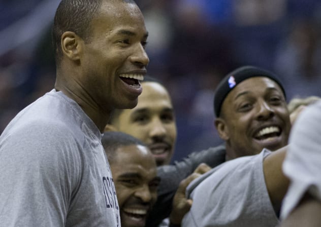 Jason Collins huddles with the Nets before playing the Washington Wizards in 2014.